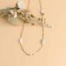 Collier Lueur bleu pose fleurs web